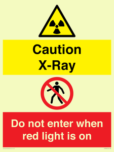 Caution X-Ray. Do not enter when red light is on